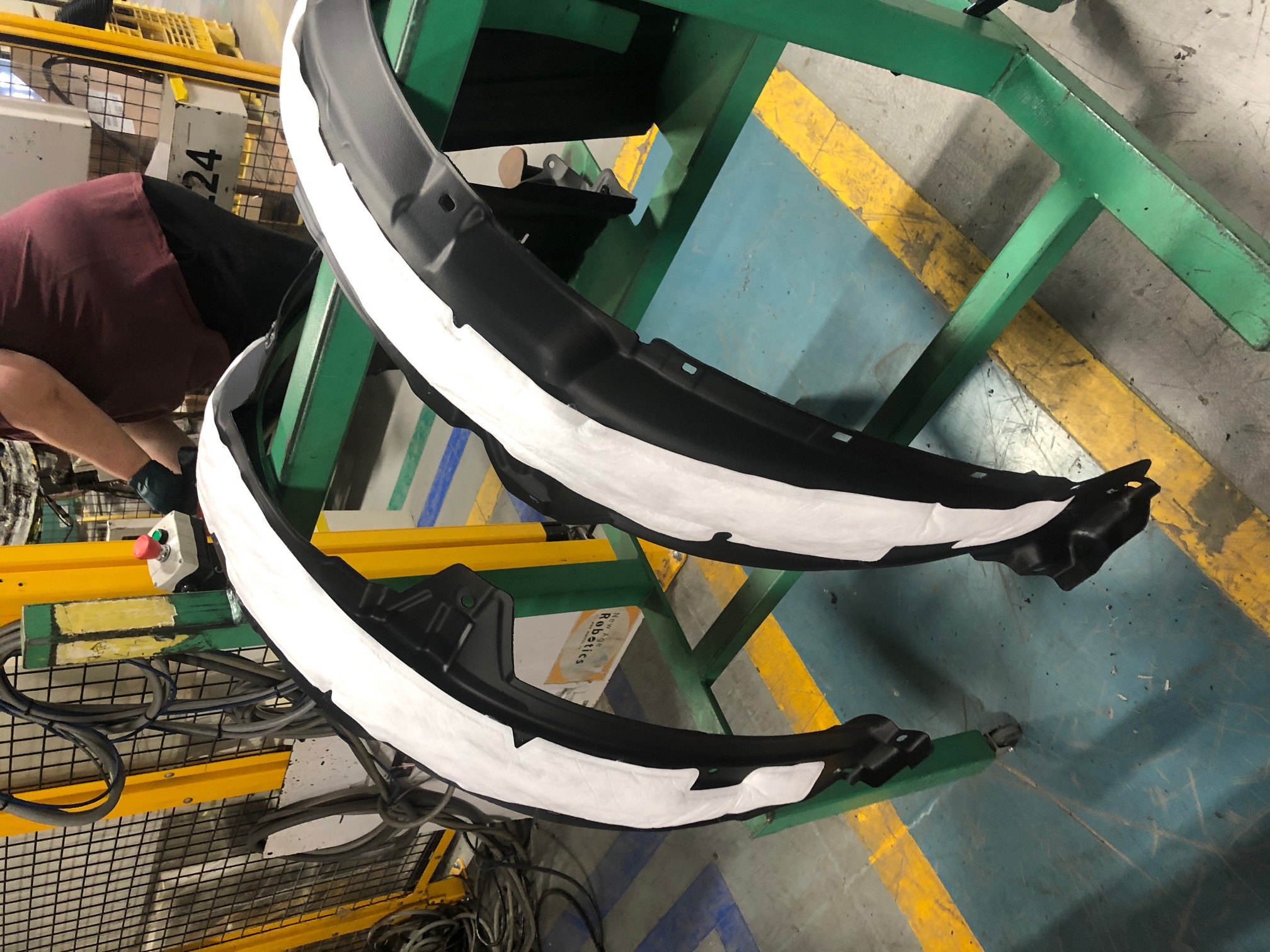 Cut and seal parts used to insulate automotive wheel liners