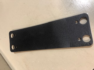 Self-adhesive die cut gasket.  These gaskets can be made in any size or shape, various materials can be used, and adhesives can be applied to the back for easy installation.  Material supplies such as McMaster Carr can supply material to specification, and Roylco can cut the materials to shape.  Tooling is inexpensive and can be produced in a couple of days. 

